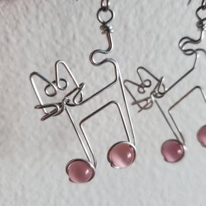 Silver wire-wrapped cat music note dangle earrings, pink beads